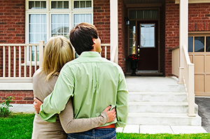 Home buyers viewing new home